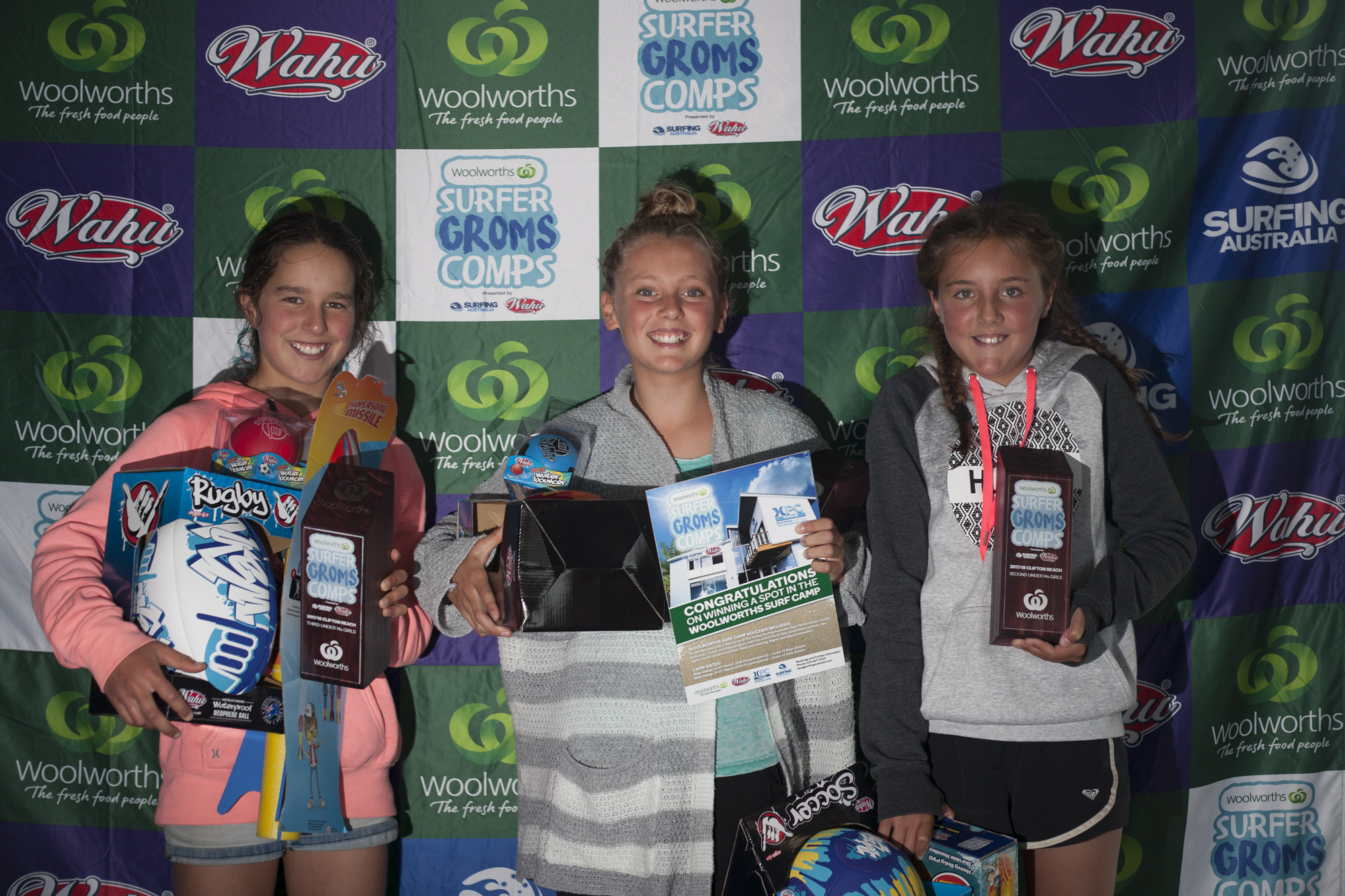 Lily Mereszka ( Clifton Beach) shows her ticket to Woolworths HPC Camp!